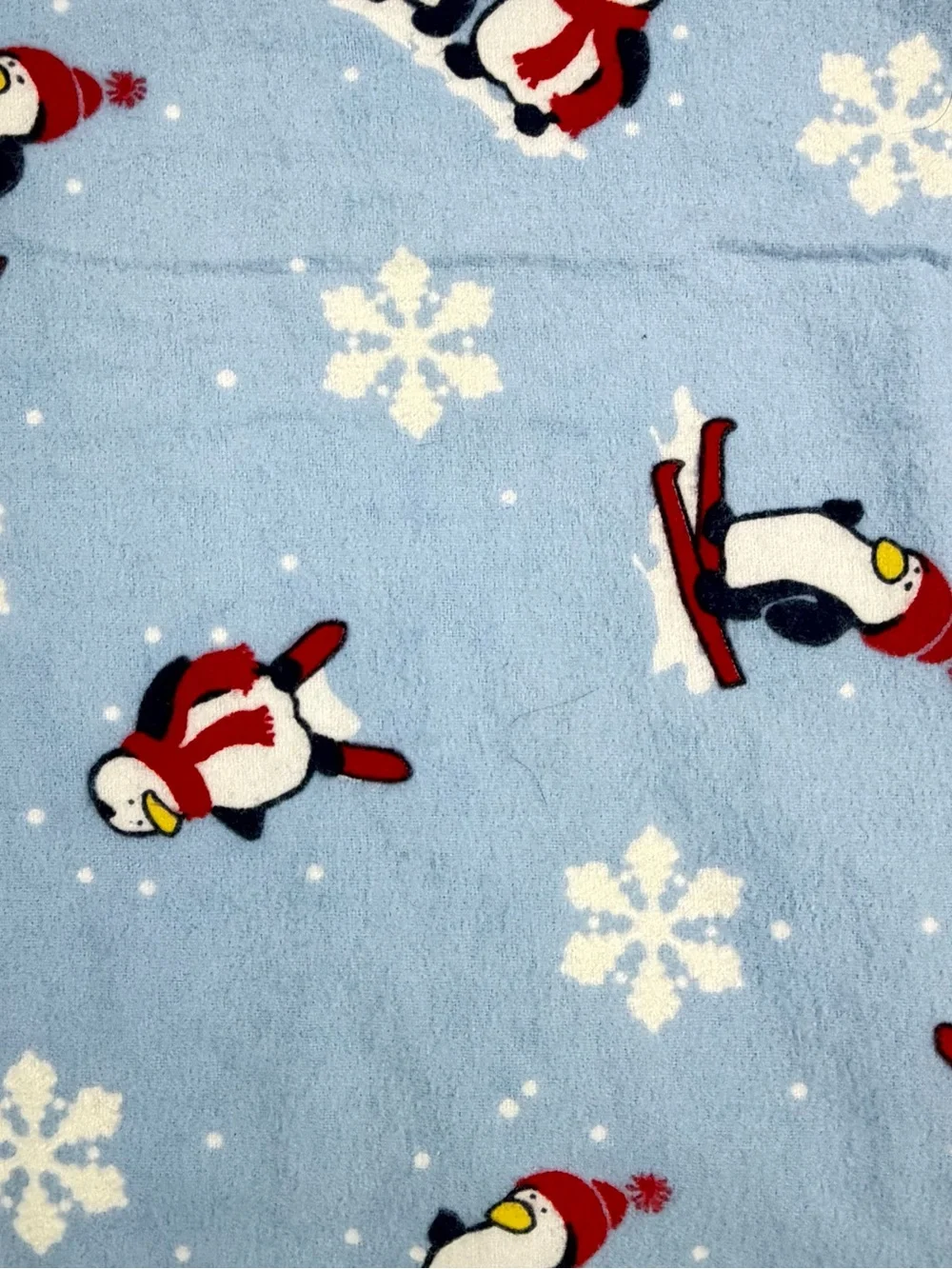 Light Blue Reversible Penguin & Animal Print Quilt Throw